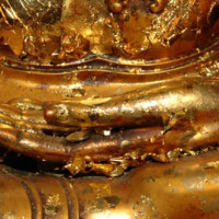 Hand van gouden Boeddha